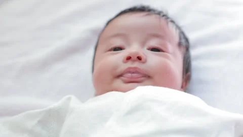 The baby boy sleeping on the bed Stock Footage 327848076