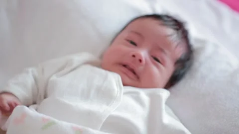 The baby boy sleeping on the bed Stock Footage 327848095