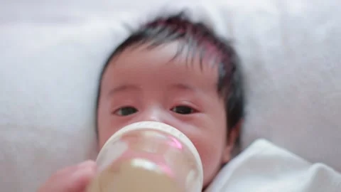 The baby boy sleeping on the bed Stock Footage 327848153