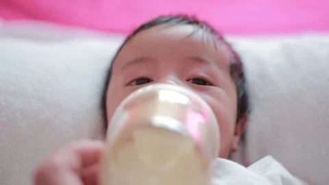 The baby boy sleeping on the bed Stock Footage 327848276