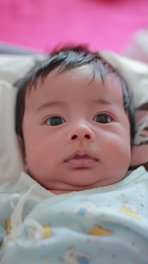 The baby boy sleeping on the bed Stock Footage 327848372