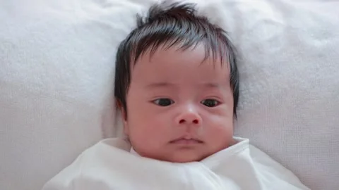 The baby boy sleeping on the bed Stock Footage 327848406