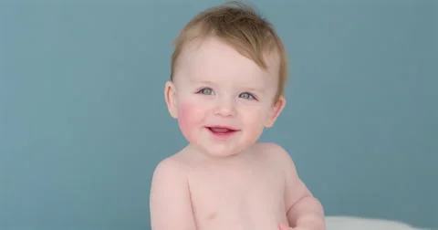 Baby boy smiling in camera slow motion Stock Footage 45702216