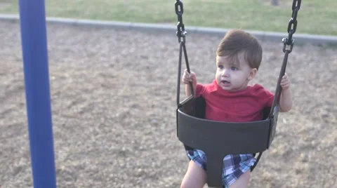 Baby boy on swing 스톡 동영상 44058122