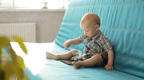 Baby boy  with tablet PC Stock Footage 50347234