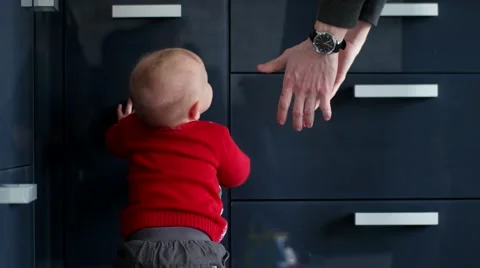 Baby Boy Walking His First Step With His Fathers help Stock Footage 60574351