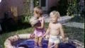 Baby Boys Play in Backyard Kiddie Pool 1950s Vintage Film Home Movie Retro 1603 HD Footage