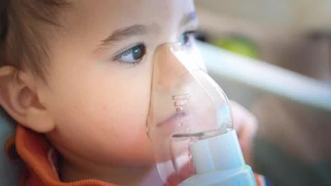 Baby breathing using inhalation machine Stock Illustration