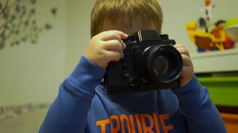 Baby with camera close up Stock Footage 71702515