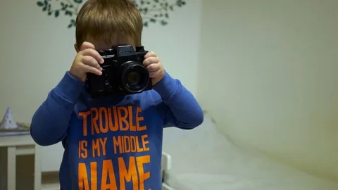 Baby with camera Stock Footage 71751617