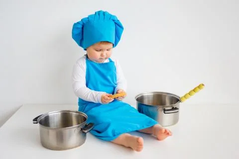 Baby in chef hat Stock Photos