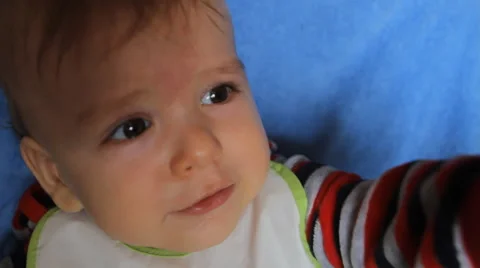 Baby chewing on an empty plastic spoon Stock Footage 49446933