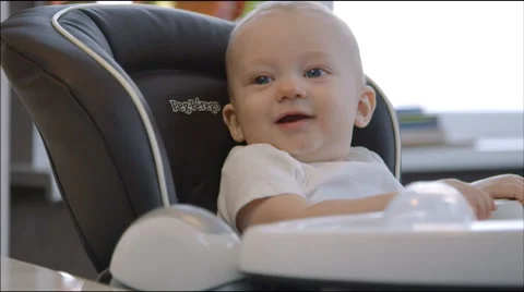 Baby at the children's table Stock Footage 40541089