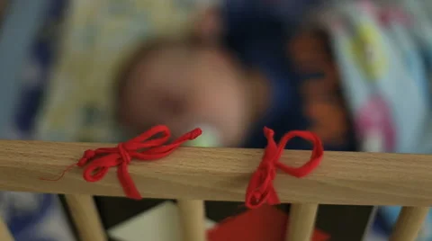 Baby in cot Stock Footage 41749991