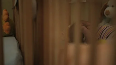 Baby in cot Stock Footage 41752834