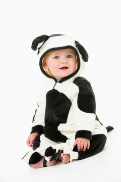 Baby in cow costume Stock Photos