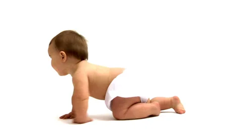 Baby crawling across white background Stock Footage