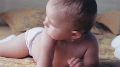 Baby crawling on the bed. Stock-Footage 53254772