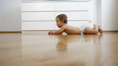 Baby crawling on the floor. Stock Footage