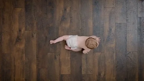 Baby crawling high angle view Stock Footage 91226217