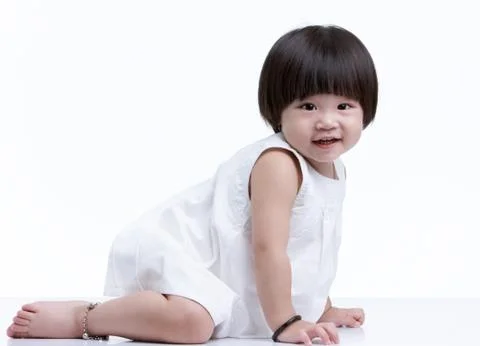 Baby crawling Stock Photos