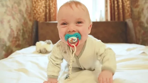 The baby crawls towards the camera Stock Footage 123723545