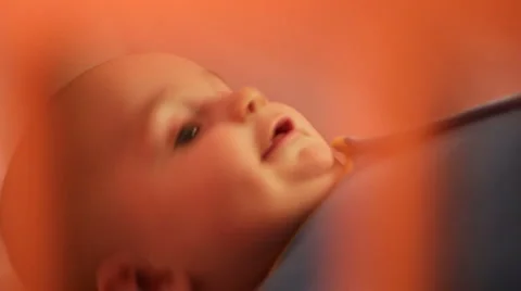 Baby in crib Stock Footage 1077719