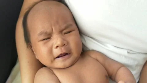 Baby crying on bed 스톡 동영상 156010350