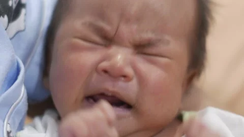 Baby crying on bed 스톡 동영상 156010405