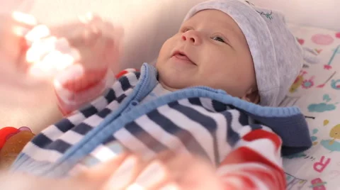 Baby crying in stroller  cradle Stock Footage 55865964