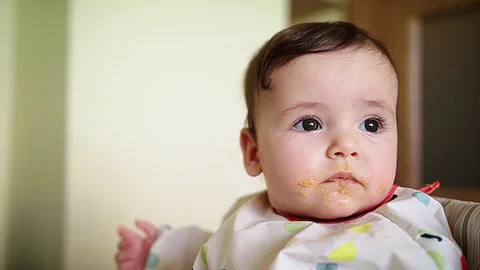 Baby doesnt eat close up side shot Stock Footage 83610260