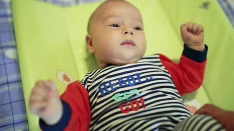 Baby doing massage Stock Footage 64655935