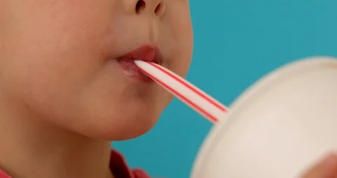 Baby drinking milkshake Stock Footage 118726220
