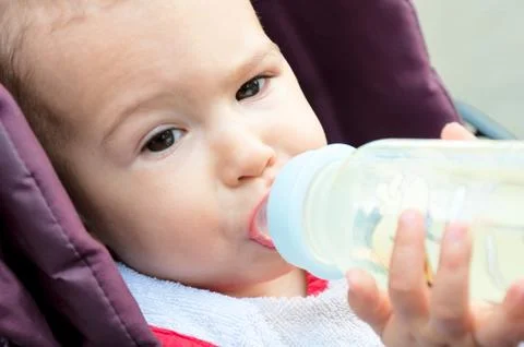 Baby drinking Stock Photos