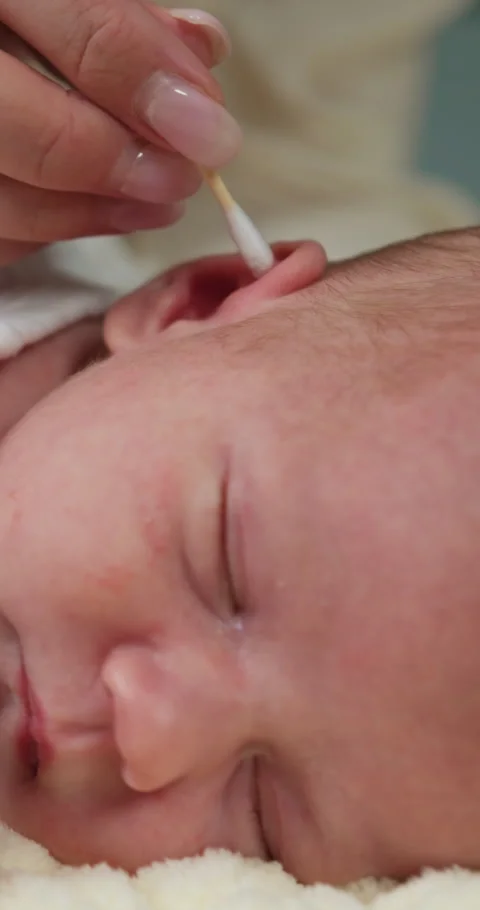 Baby Ear Cleaning Close Up Stock Footage 328467734