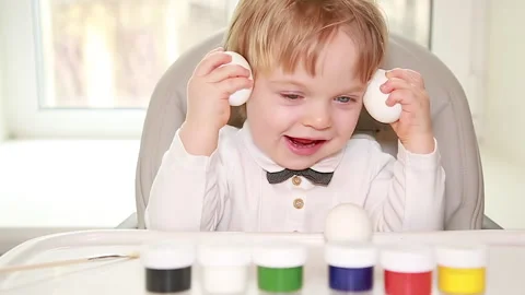 Baby with Easter eggs Stock Footage 149756878