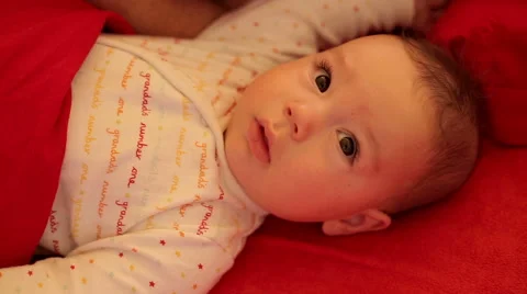 BAby face nice looking camera Stock Footage 59776414
