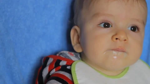 Baby fed from a spoon Stock Footage 49446861