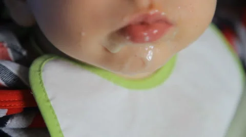 Baby fed from a spoon Stock Footage 49446880