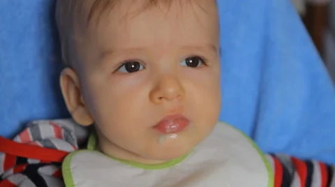 Baby fed from a spoon Stock Footage 49446885