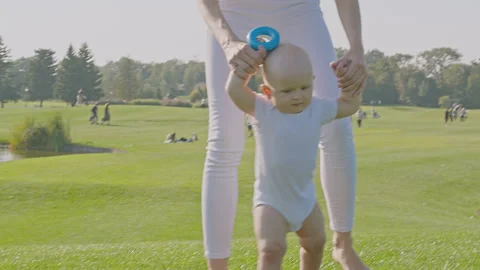 Baby first steps 4 Stock Footage 264576196