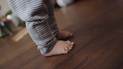 Baby first steps Stock Footage 100359747