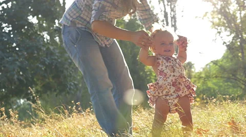 Baby first steps nature Stock Footage 55545117