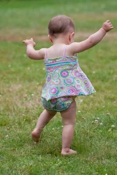 Baby first steps Stock Photos