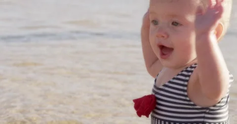 Baby Flapping &amp; Playing in Water at Beach Stock Footage 59868071
