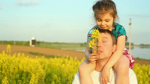 Baby in the flowers. Dad Stock Footage