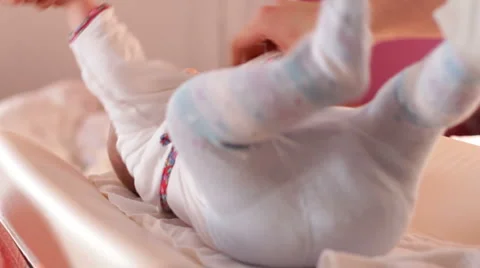 Baby getting dressed 1 Stock-Footage 1077423