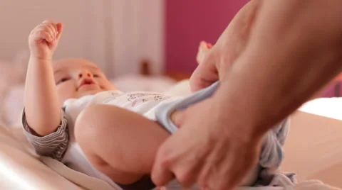 Baby getting dressed 2 Video stock 1077398