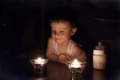 The baby is getting ready for bed Stock Photos