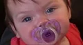baby girl 5 months dummy pacifier HD Footage